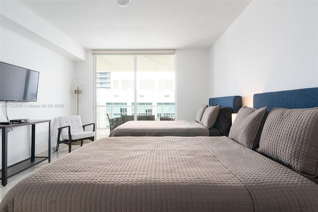 bedroom with expansive windows