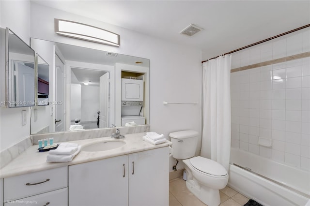 full bathroom with toilet, stacked washer / drying machine, tile patterned floors, shower / bath combo with shower curtain, and vanity