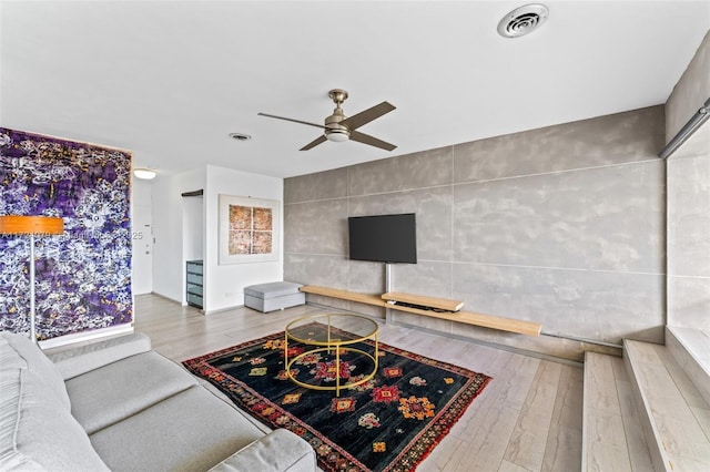 3 Island Ave Pha, Pha, Miami Beach, FL 33139 - living area featuring visible vents, ceiling fan, tile walls, and wood finished floors