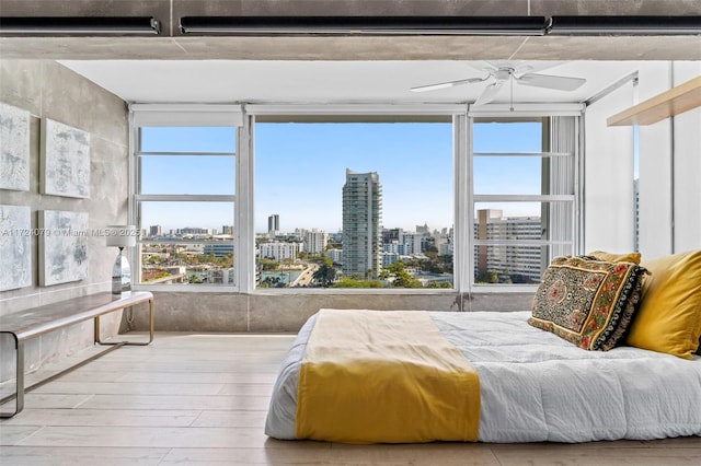 3 Island Ave Pha, Pha, Miami Beach, FL 33139 - bedroom with a city view, wood-type flooring, and a ceiling fan