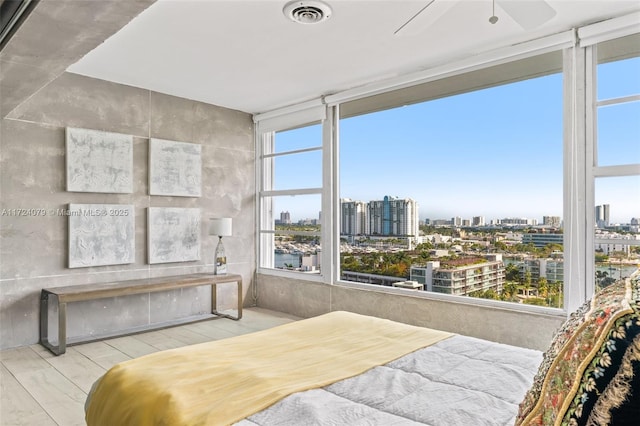 3 Island Ave Pha, Pha, Miami Beach, FL 33139 - bedroom with a city view, visible vents, multiple windows, and wood finished floors