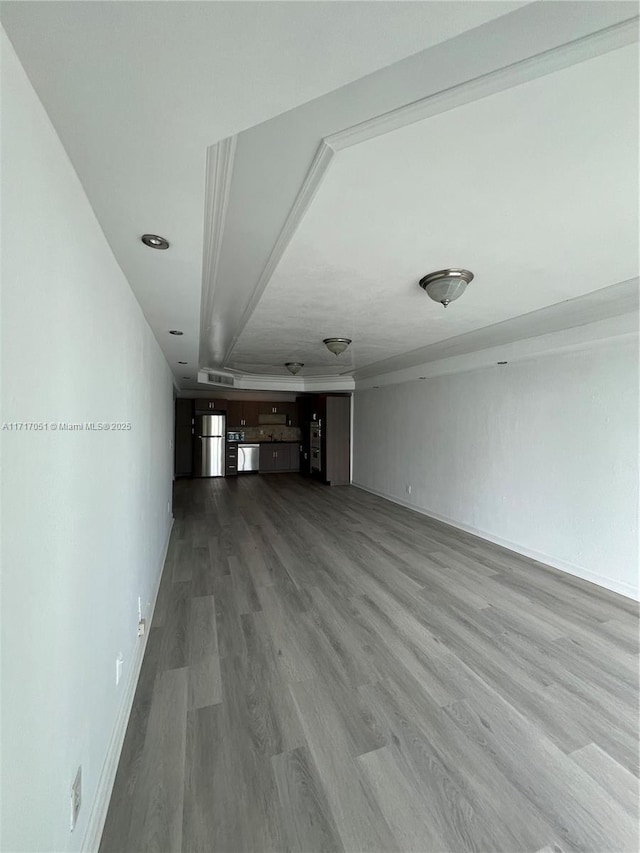 unfurnished living room with light hardwood / wood-style floors