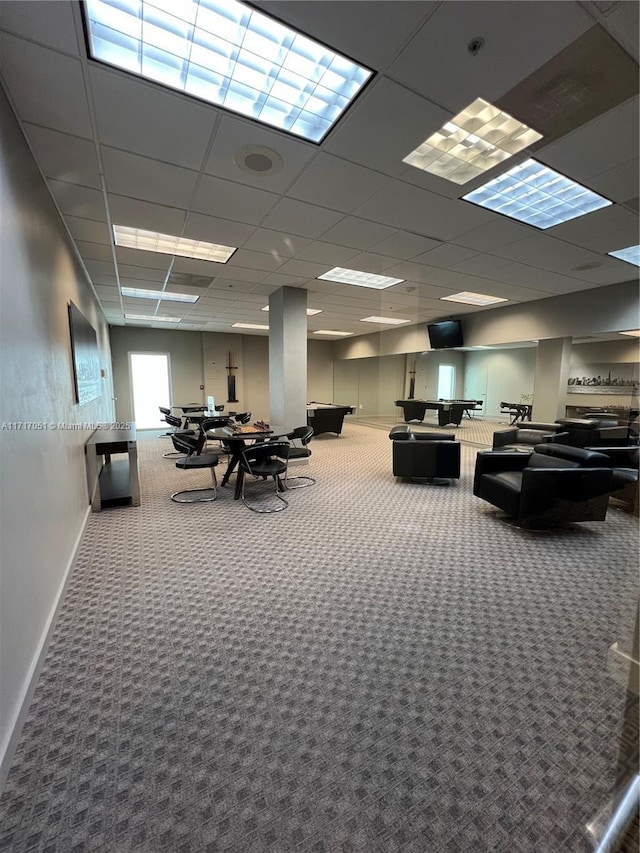 miscellaneous room featuring carpet floors and a drop ceiling