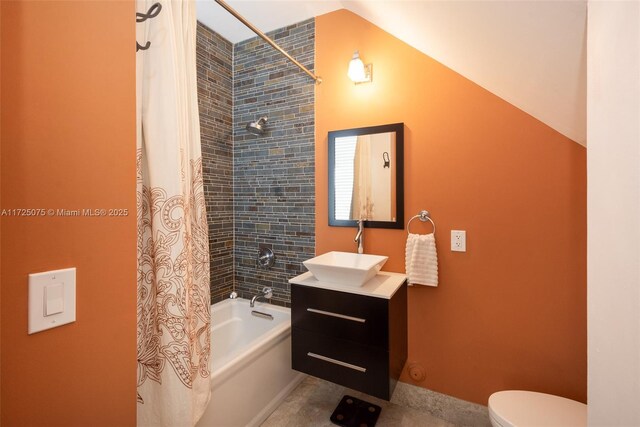 bedroom featuring ensuite bath, ceiling fan, and dark hardwood / wood-style floors