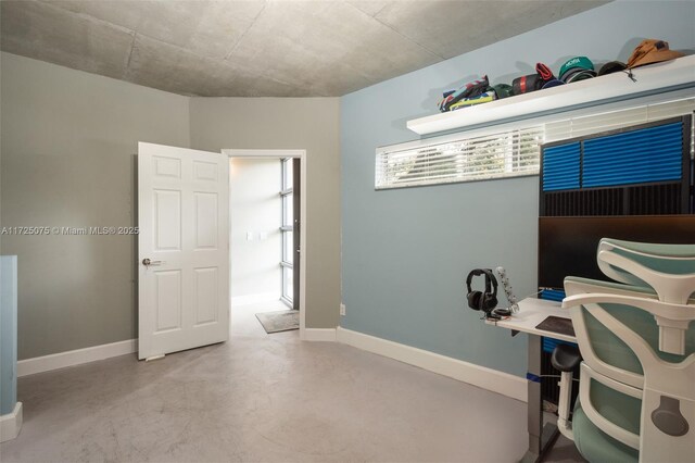 bathroom with a tile shower, vanity, and toilet