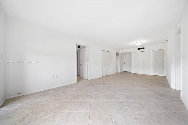 view of tiled spare room