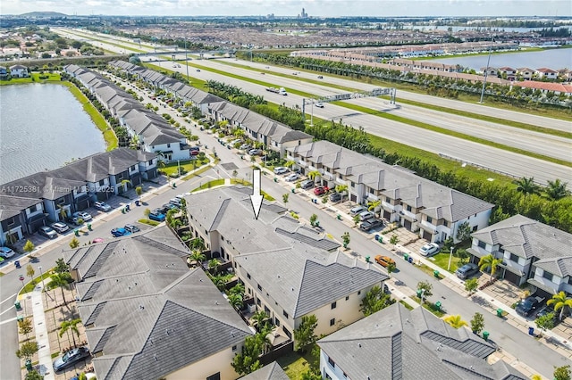 bird's eye view with a water view