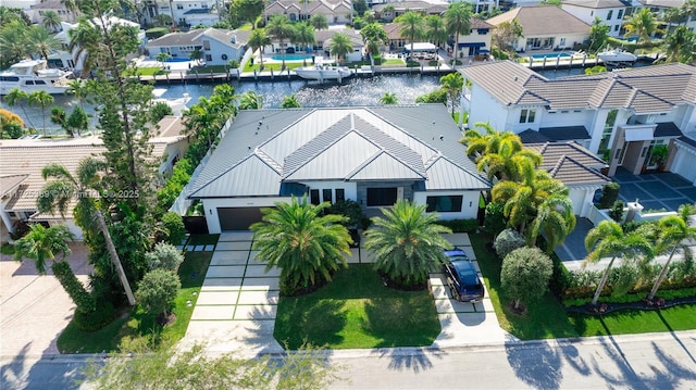 drone / aerial view featuring a water view