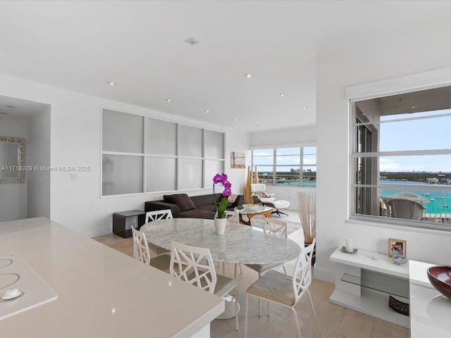 dining area with light hardwood / wood-style flooring