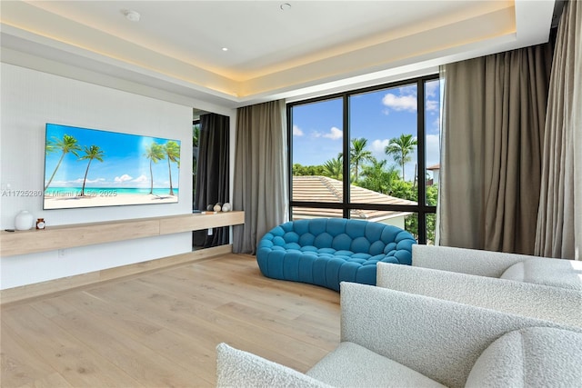 living room featuring hardwood / wood-style floors and floor to ceiling windows