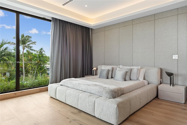 bedroom with light wood-type flooring