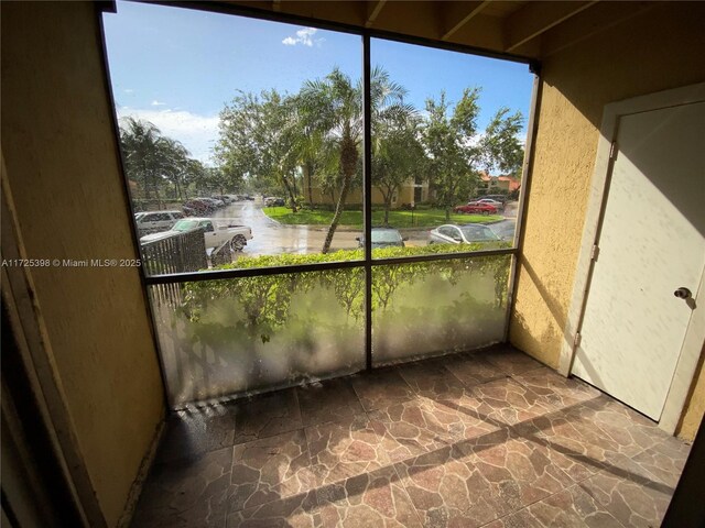 view of unfurnished sunroom