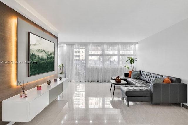 living room with a healthy amount of sunlight and expansive windows