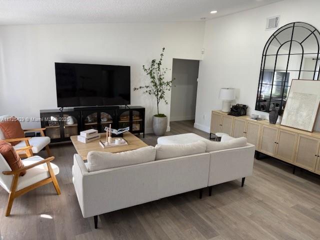 living room with hardwood / wood-style floors