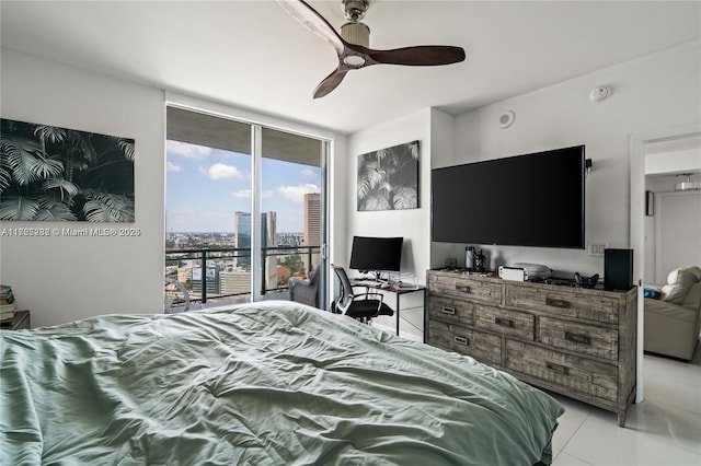 bedroom with light tile patterned flooring, ceiling fan, access to outside, and expansive windows