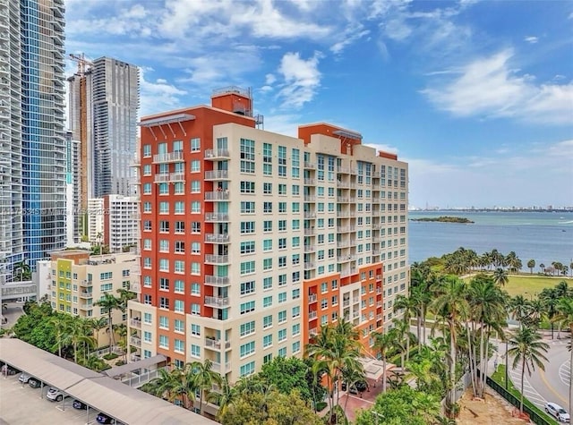 view of building exterior featuring a water view