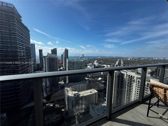 balcony featuring a city view