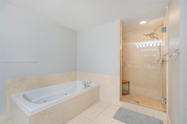 bathroom with tile patterned flooring and plus walk in shower