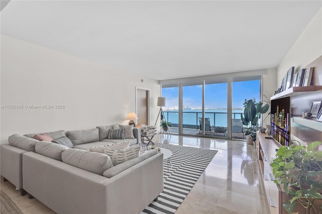 living room with floor to ceiling windows