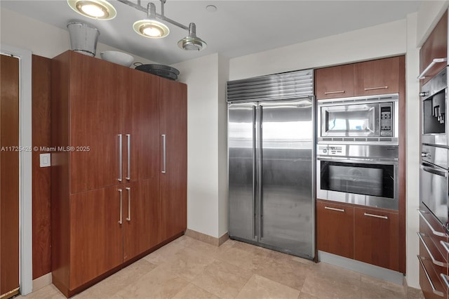 kitchen featuring built in appliances