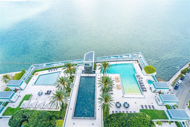 birds eye view of property featuring a water view