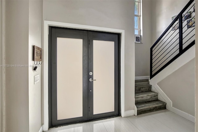 entrance foyer featuring french doors