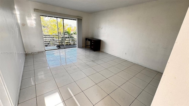 view of tiled spare room