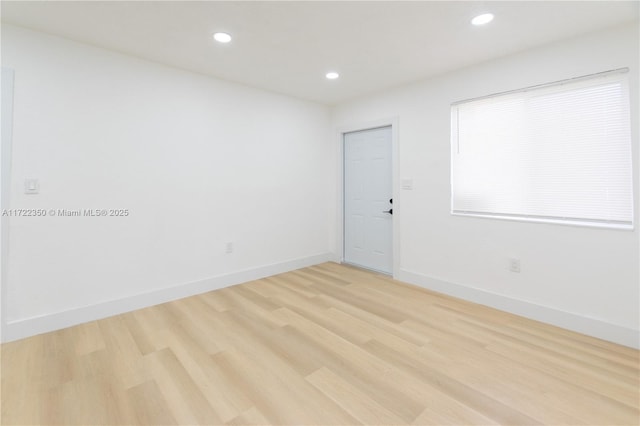 empty room featuring light hardwood / wood-style flooring