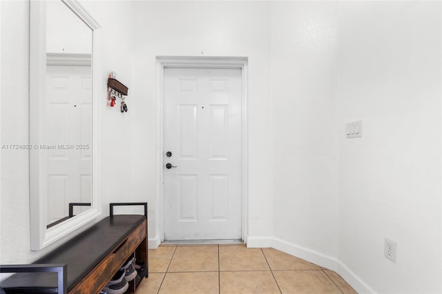 interior space featuring light tile patterned floors