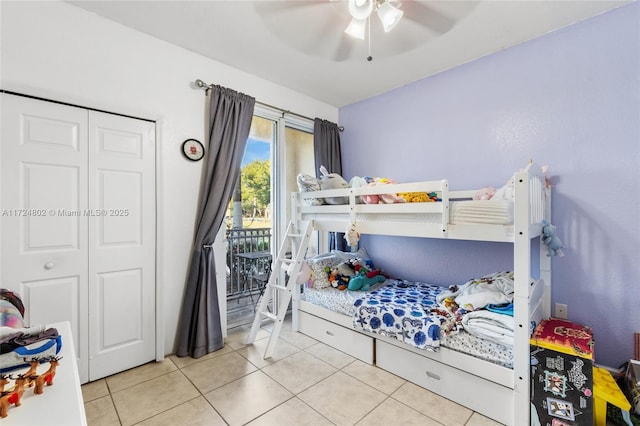 tiled bedroom featuring access to exterior, a closet, and ceiling fan