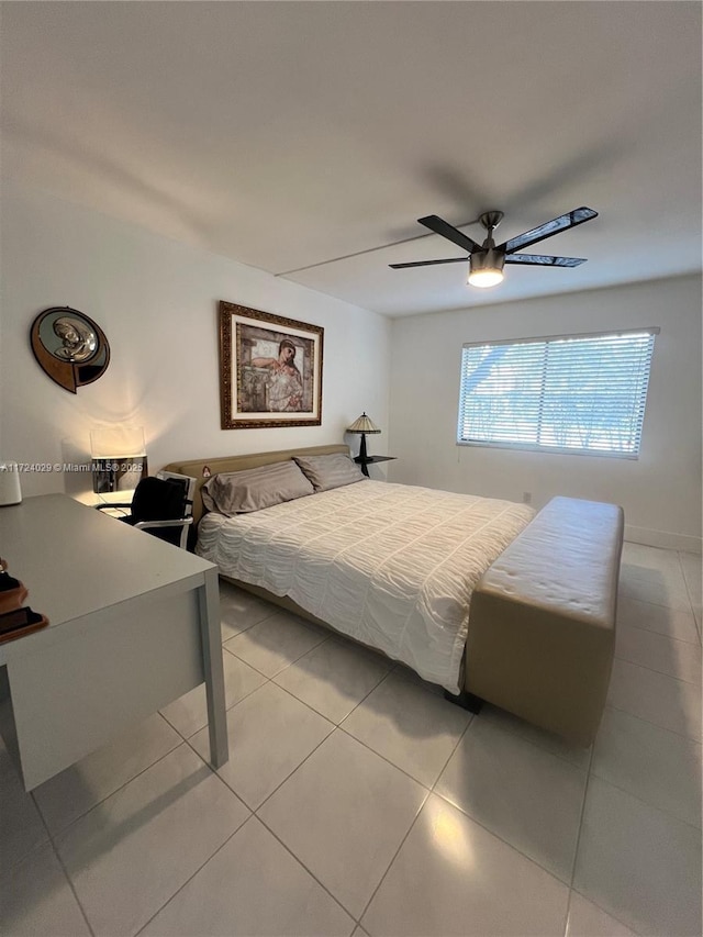 bedroom with light tile patterned flooring and ceiling fan