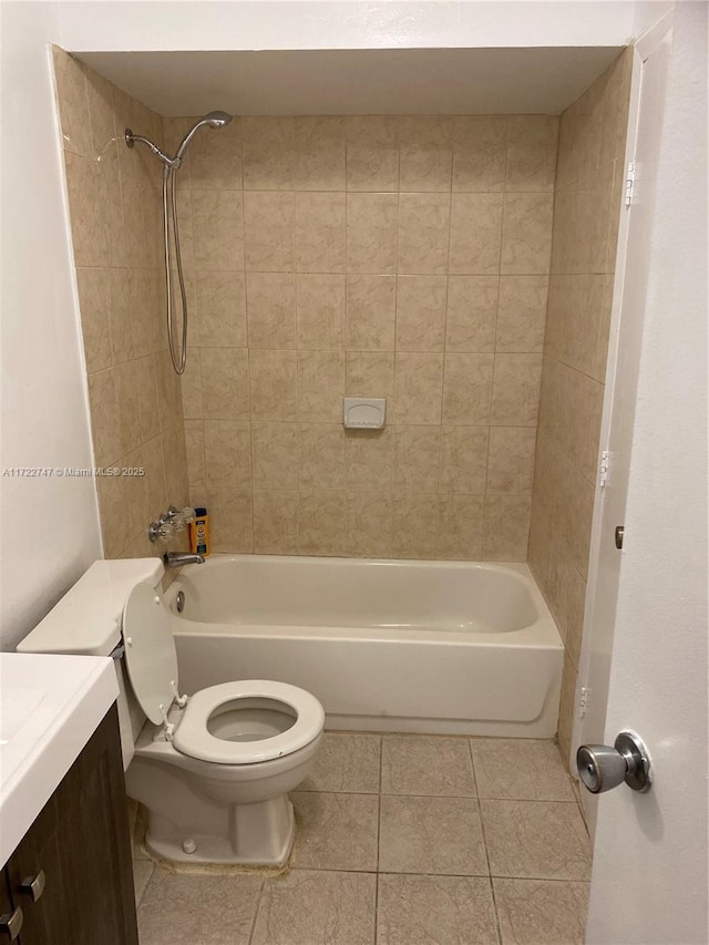 full bathroom with toilet, vanity, tile patterned floors, and tiled shower / bath