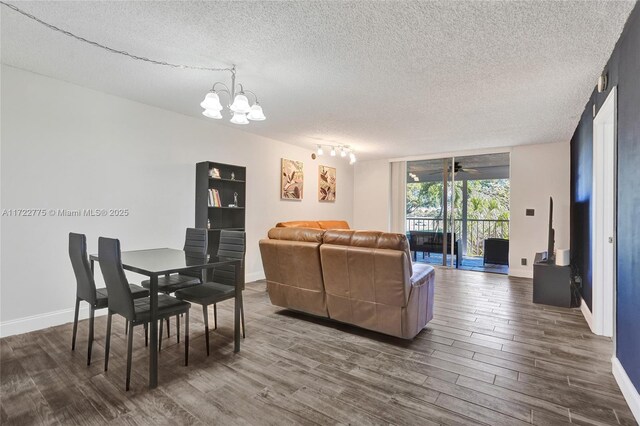 4570 NW 18th Ave Unit 202, Deerfield Beach, FL 33064 - kitchen with white appliances, a sink, light countertops, white cabinets, and a textured ceiling