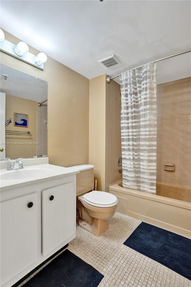 full bathroom with toilet, vanity, tile patterned floors, and shower / bath combination with curtain