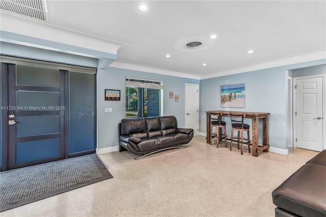 living room featuring ornamental molding