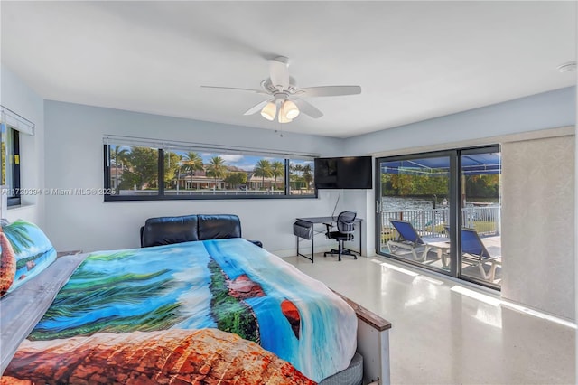 bedroom with concrete flooring, ceiling fan, access to exterior, and multiple windows