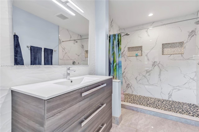 bathroom featuring vanity and a shower with curtain