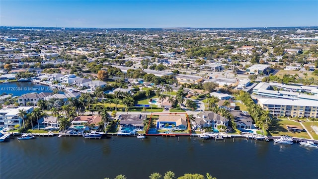 birds eye view of property featuring a water view