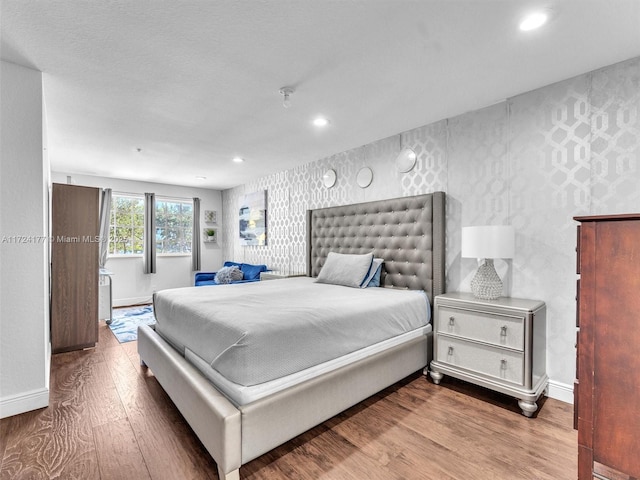 bedroom featuring hardwood / wood-style flooring