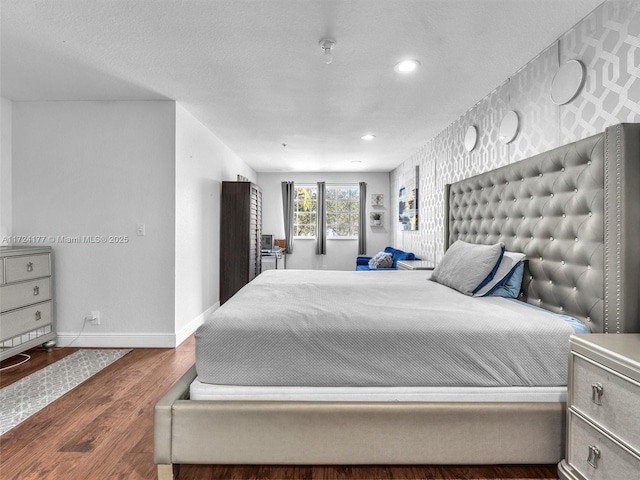 bedroom with wood-type flooring