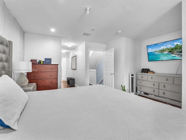 bedroom with a textured ceiling