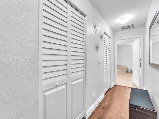 hall featuring hardwood / wood-style flooring