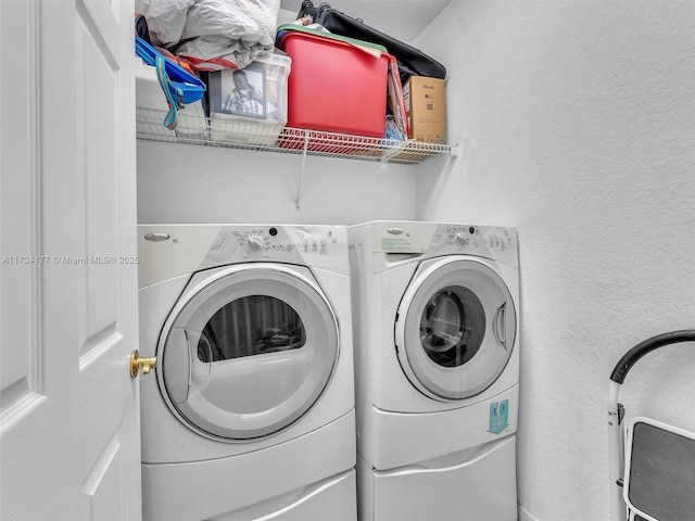 laundry area featuring washing machine and dryer