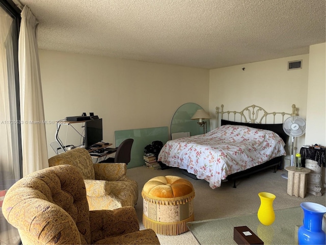 bedroom with a textured ceiling