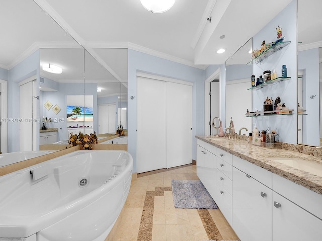 bathroom featuring tile patterned floors, a bathtub, vanity, and crown molding