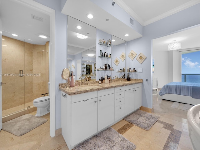 bathroom with vanity, toilet, ornamental molding, and an enclosed shower