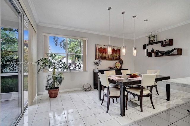 tiled dining space featuring crown molding