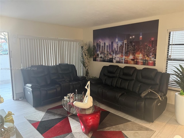 living room featuring plenty of natural light