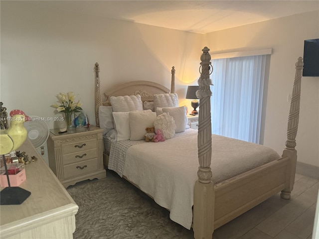 bedroom featuring dark wood-type flooring