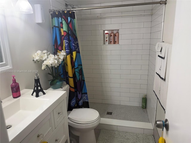 bathroom featuring vanity, tile patterned floors, curtained shower, and toilet